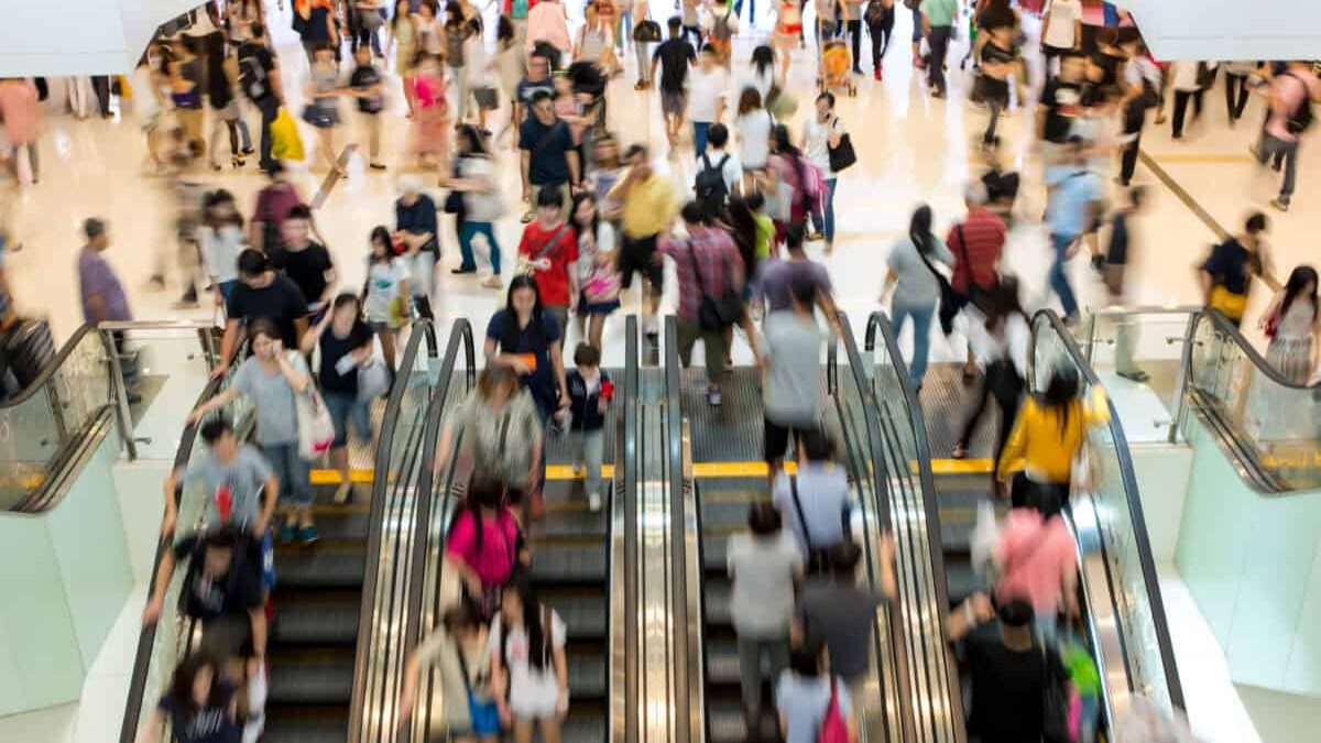 shoppers in an indoor mall